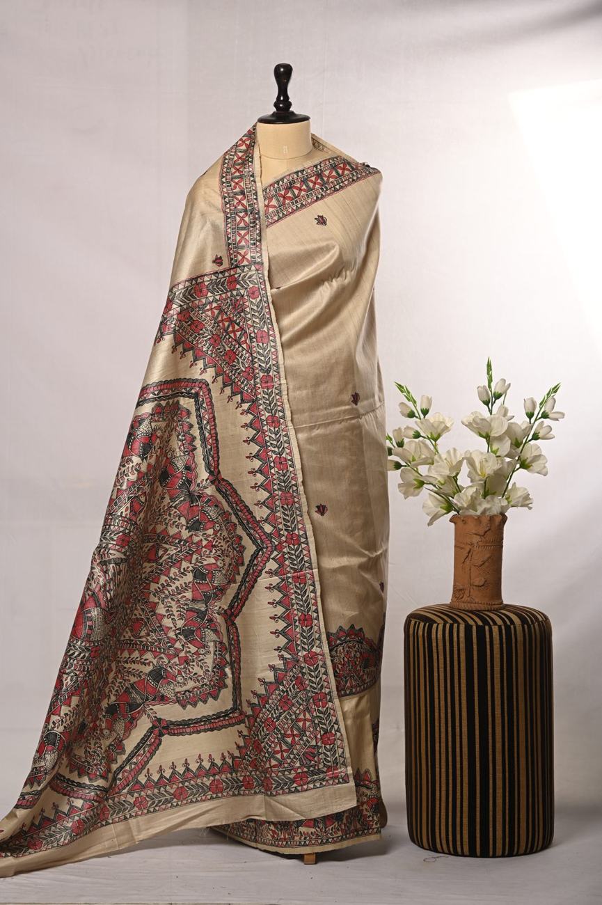 Ivory silk saree with hand-painted red and black motifs